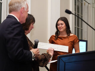 Georgia Perry, right, presented with the Sean F. Mellon Memorial Scholarship in New York City on Wednesday, November 8, 2023.